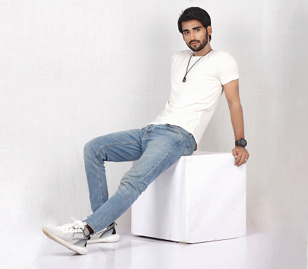 Pakistani Male Model posing in white dress