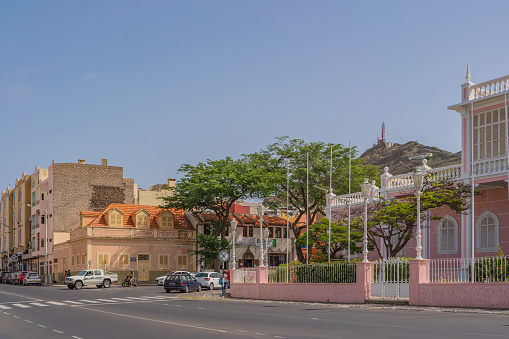 Mindelo, Sao Vicente Island, Cape Verde - October 12.2023: Street scene with the Palacio do Povo - People Palace, at the centre in Mindelo, Cape Verde