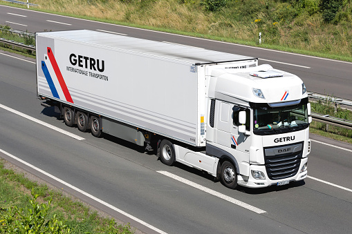 Wiehl, Germany - June 25, 2020: GETRU DAF XF truck with temperature controlled trailer on motorway
