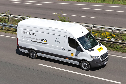 Wiehl, Germany - June 25, 2020: Hertz Mercedes-Benz Sprinter on motorway