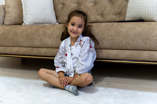 Portrait of a girl lying at home.