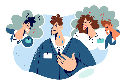 Business man worried about bullying from colleagues criticizing ideas and plans out of envy. Concept problem of bullying in company caused by groundless criticism and toxic attitude towards newcomers
