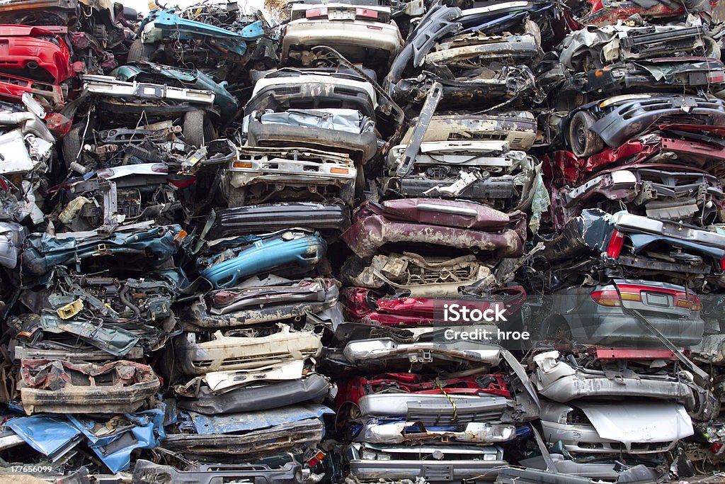 Car piles crushed Stacked crushed cars going to be shredded in a recycling facility Car Stock Photo
