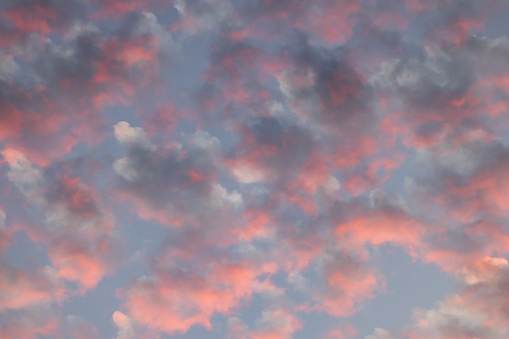 Multi colors clouds on sunset sky.