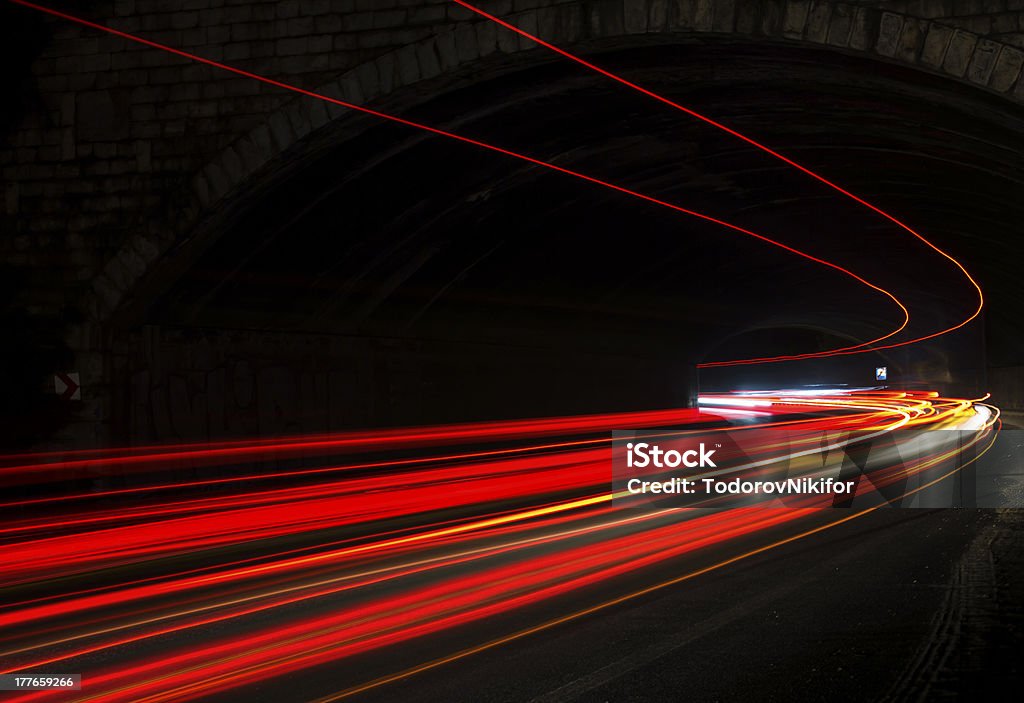 Car light trails in the tunnel Long exposure photo taken in a tunnel Multiple Exposure Stock Photo