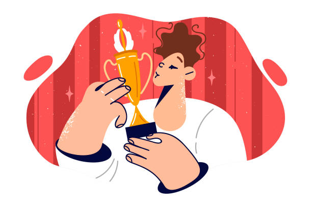 ilustrações de stock, clip art, desenhos animados e ícones de boy kisses golden cup after winning competition or sports tournament among school students - child prodigy