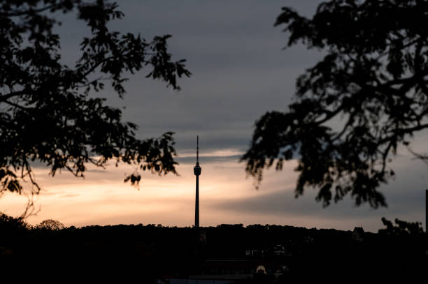istock Stuttgart TV tower at dusk, framed by trees 1776648656