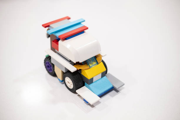 istock White plastic toy car made of different pieces on a white background 1776655520