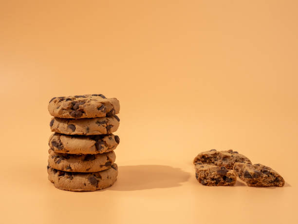 istock Oatmeal cookies with chocolate chips on an orange background. 1776660233
