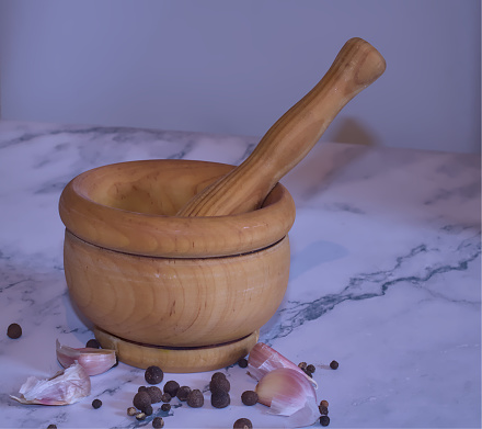 wooden pestle and mortar for grinding food spices