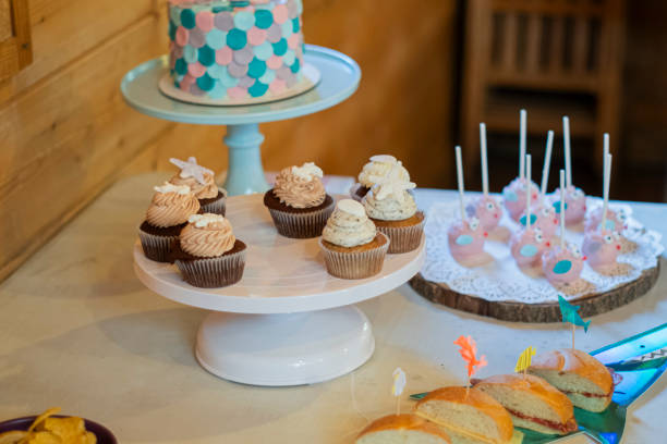istock Sea shells decorated muffin cupcakes on a birthday party 1776663527