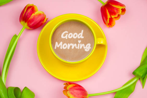 istock Top view coffee cup and tulips on pink background. Spring good morning card. 1776690353