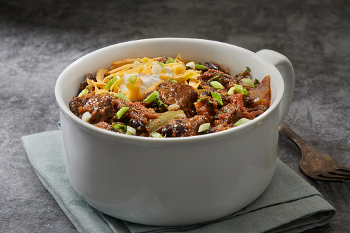 Steak Chili with Black Beans, Onions, Scallions and Cheddar Cheese