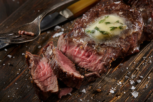 Medium Rare Venison Strip Loin Steak with Finishing Salt and Herb Compound Butter