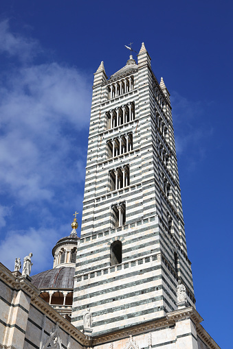 Ancient Bell Tower of the Cathedral of Siena in the Tuscany Region in Italy