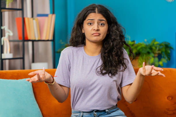 istock Confused Indian woman feeling embarrassed about ambiguous question, having doubts, no idea 1776712028