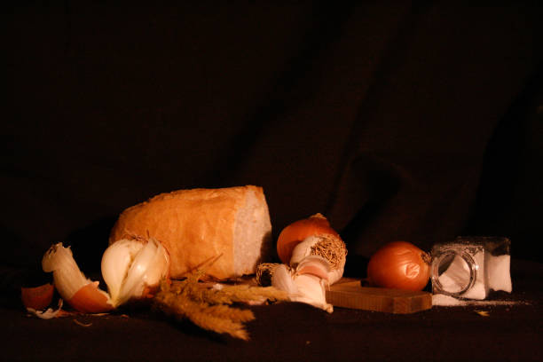 istock Rustic Still Life with Bread, Onion, Salt, and Garlic 1776712608