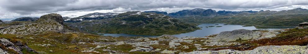 Panoramic view of Ståvatn lake and Sveigen Haukeli, Trollnup peaks from the summit of Kista, Norway