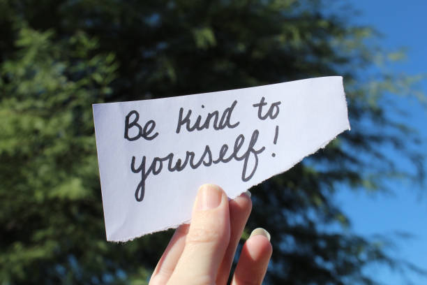 istock Be kind to yourself motivational hand written note 1776771928