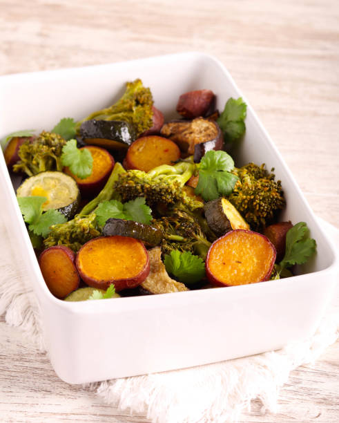 istock Baked vegetables: zucchini, eggplant, broccoli and sweet potato 1776776875