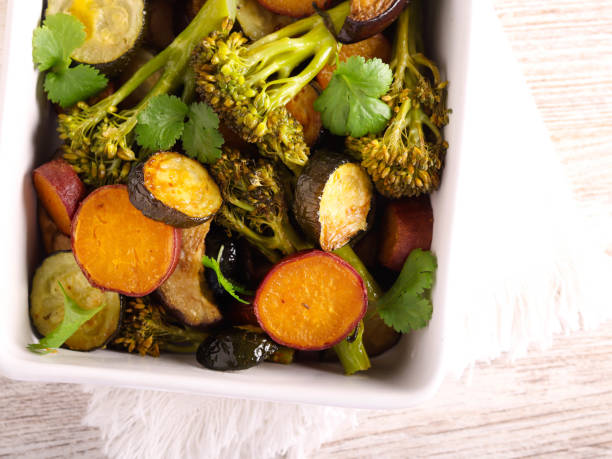 istock Baked vegetables: zucchini, eggplant, broccoli and sweet potato 1776776878