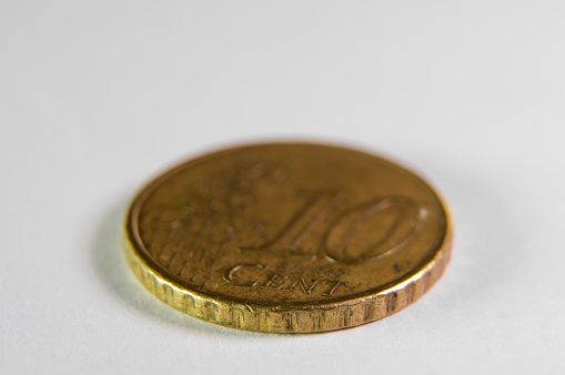 Expanded Focus: Details of a 10 Euro Cents Coin in Longitudinal Perspective.