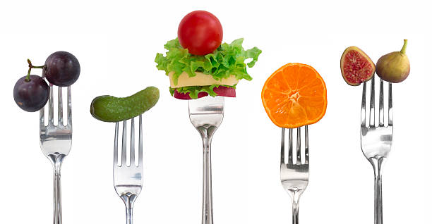 istock vegetables and fruits on the forks 177678612
