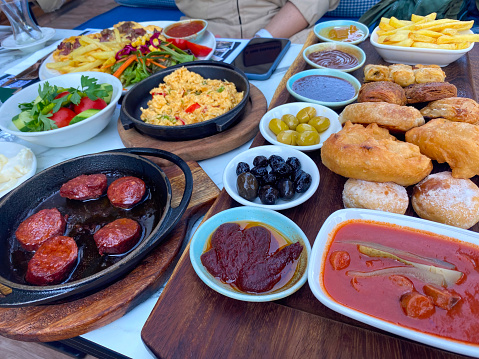 Turkish breakfast with pastries and sausage. in Turkey