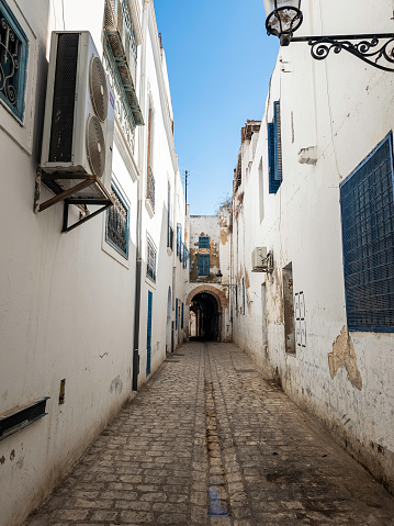 Typical street in the Medina in Tunis with white and blue tones, Tunisia