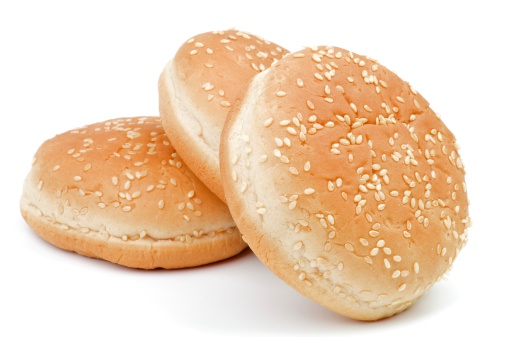 Arrangement of Three Burger Sesame Seed Buns isolated on white background