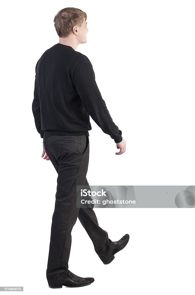 Vista posterior de un hombre de negocios de pie - Foto de stock de Actividad libre de derechos