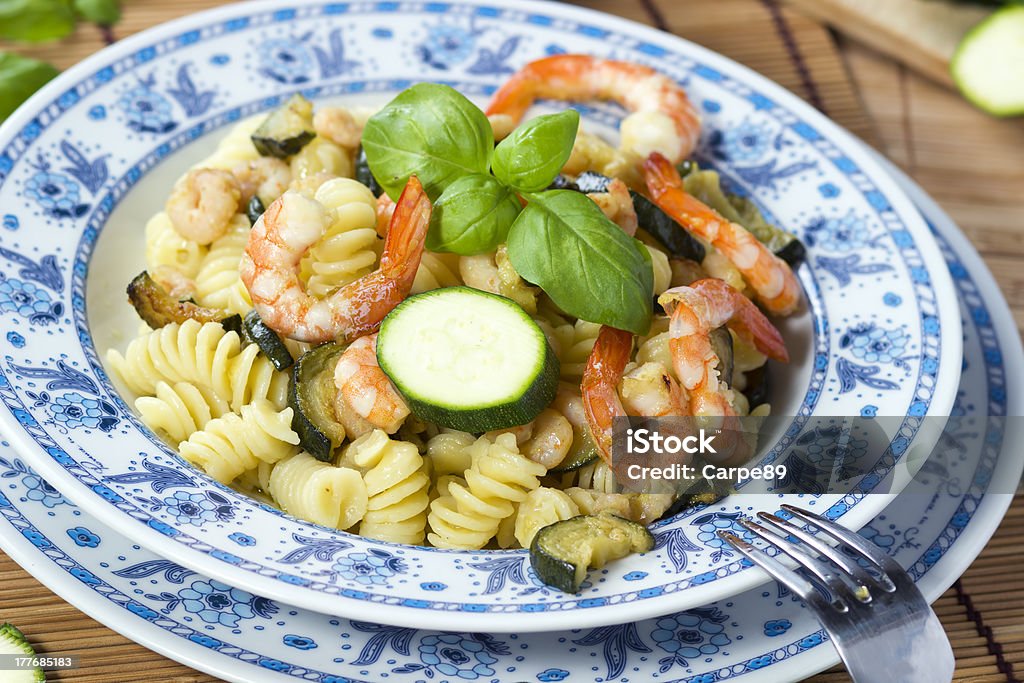 Pasta with  Shrimp and zucchini Fusilli Stock Photo