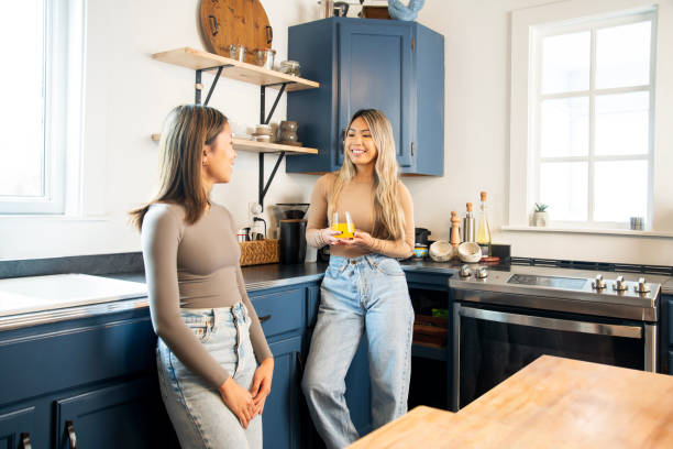 istock Two sisters enjoying a morning chat 1776853899
