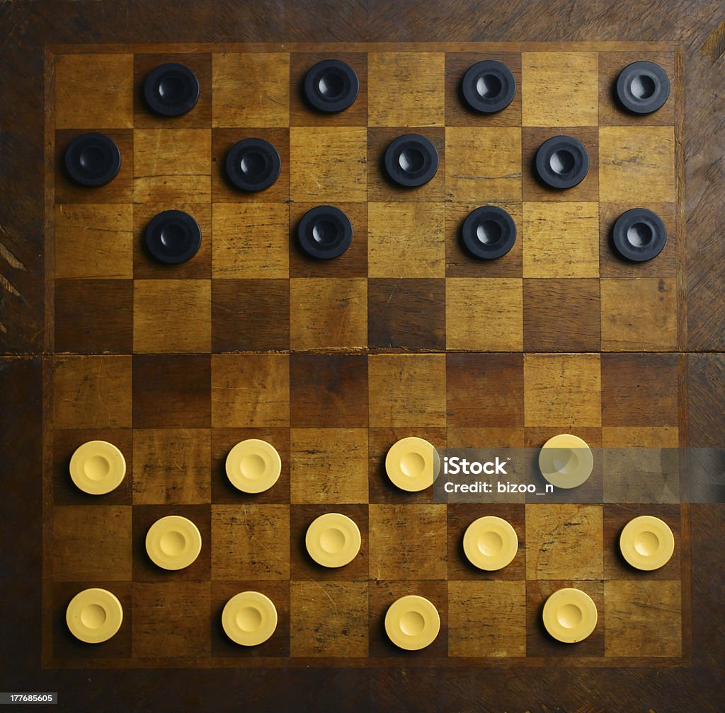 Checkers game Color shot of a vintage draughts or checkers board game. Activity Stock Photo