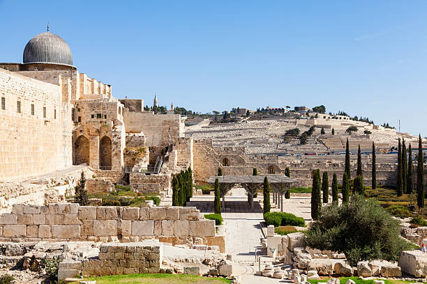 Jerusalem wall View of old city wall of Jerusalem with Al Aksa mosque, Mount Olive and the cemetery al aksa stock pictures, royalty-free photos & images