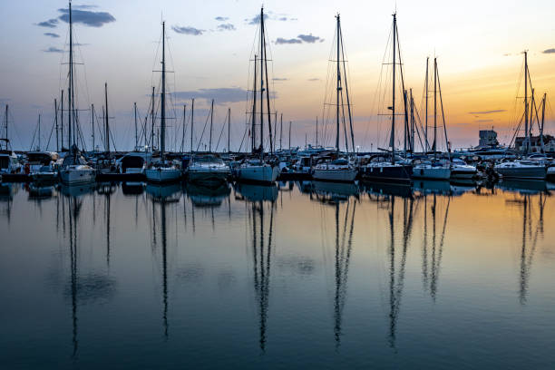 Peschici, Rodi Garganico, Foggia, Puglia, Italy: Sailboats on the marina at dawn