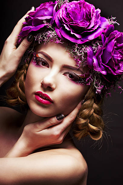istock Girl with purple flowers 177688314