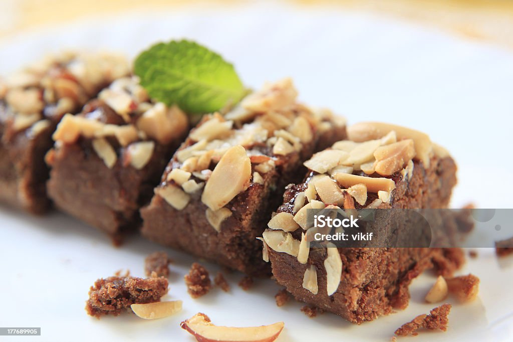 Lenten Almond Cake Kwarezimal - Maltese lenten cookies sprinkled with chopped nuts Almond Stock Photo