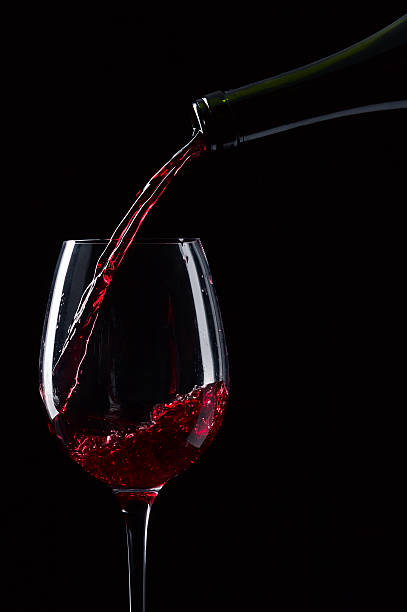 istock bottle and glass with red wine 177690163