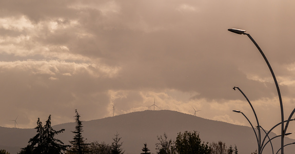 Wind turbine, sky and mountain