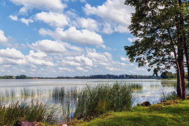 istock Lake shore with boats and beautiful sky 1776905988
