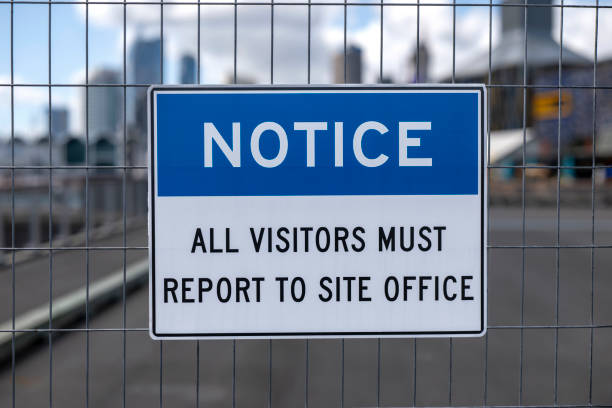 Notice sign in front of a building site