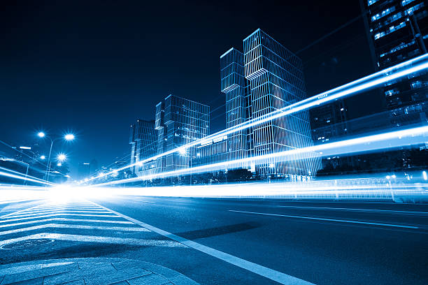 istock light trails on the road with blue tone 177690869