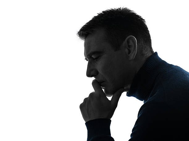 istock man serious thinking pensive silhouette portrait 177692710