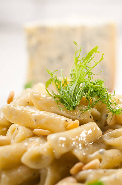 istock Italian pasta penne gorgonzola and pine nuts 177694229