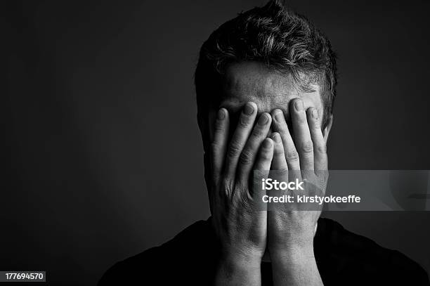 Despair Stock Photo - Download Image Now - Men, Head In Hands, Depression - Sadness