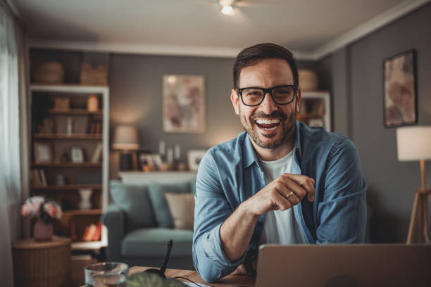istock Portrait of a handsome Caucasian man using modern devices to work online 1776946612