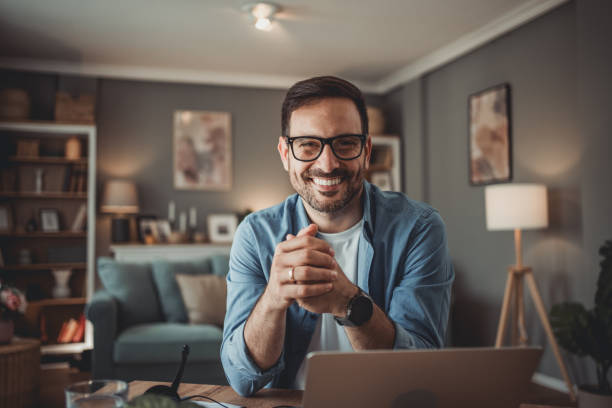 istock Portrait of a handsome Caucasian man using modern devices to work online 1776946618
