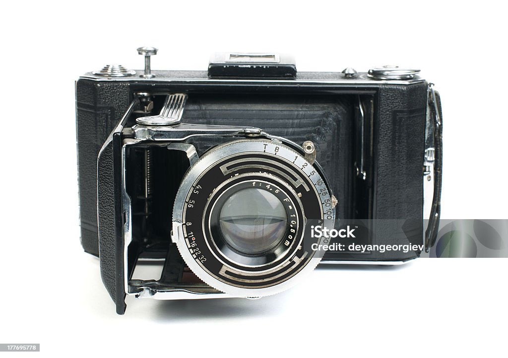 Vieja cámara vintage aislado blanco - Foto de stock de Acero libre de derechos