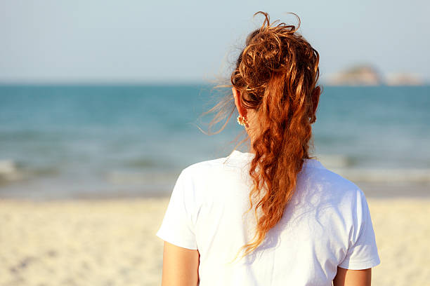 istock Woman looking to the sea 177697551